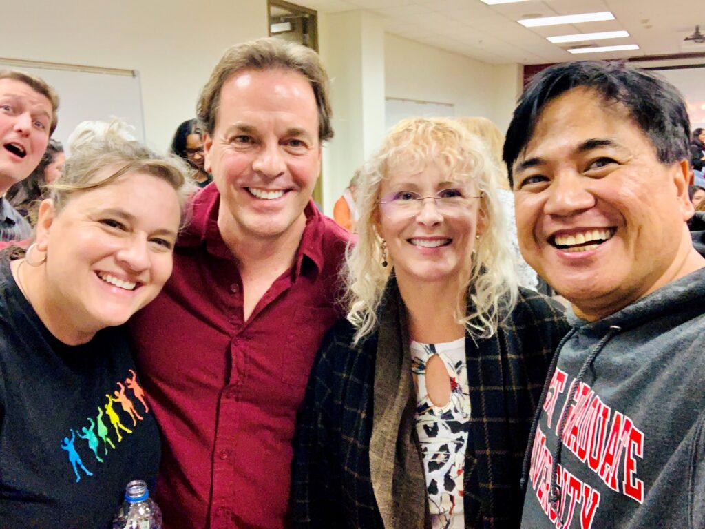 Stephen Gilliland standing with friends